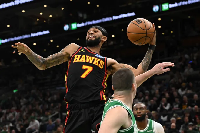 Jan 28, 2026; Boston, Massachusetts, USA; Atlanta Hawks guard Nickeil Alexander-Walker (7) passes the ball against the Boston Celtics during the first half at the TD Garden. Mandatory Credit: Brian Fluharty-Imagn Images