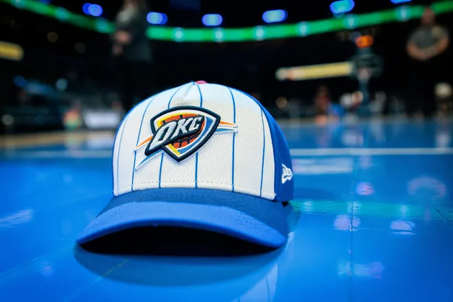 OKLAHOMA CITY, OKLAHOMA - FEBRUARY 22: An Oklahoma City Thunder hat sits courtside prior to the game against the Cleveland Cavaliers at Paycom Center on February 22, 2026 in Oklahoma City, Oklahoma. NOTE TO USER: User expressly acknowledges and agrees that, by downloading and or using this photograph, User is consenting to the terms and conditions of the Getty Images License Agreement. (Photo by William Purnell/Getty Images)