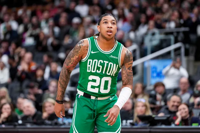 Oct 15, 2024; Toronto, Ontario, CAN; Boston Celtics guard JD Davison (20) looks on against the Toronto Raptors at Scotiabank Arena. Mandatory Credit: Kevin Sousa-Imagn Images