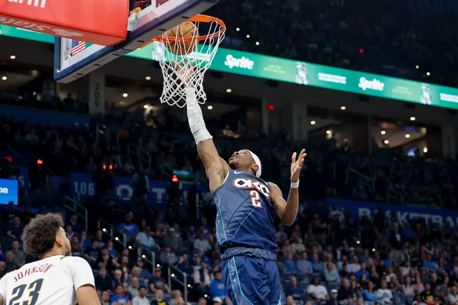 Feb 27, 2026; Oklahoma City, Oklahoma, USA; Oklahoma City Thunder guard Shai Gilgeous-Alexander (2) goes up for a basket against the Denver Nuggets during the third quarter at Paycom Center. Mandatory Credit: Alonzo Adams-Imagn Images