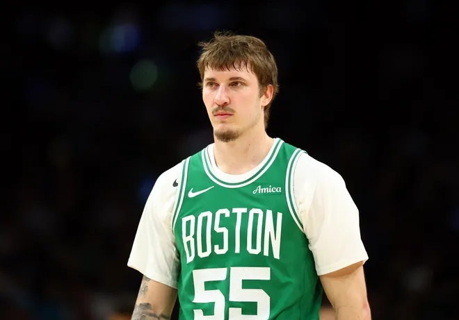 Feb 24, 2026; Phoenix, Arizona, USA; Boston Celtics guard Baylor Scheierman (55) against the Phoenix Suns at Mortgage Matchup Center. Mandatory Credit: Mark J. Rebilas-Imagn Images