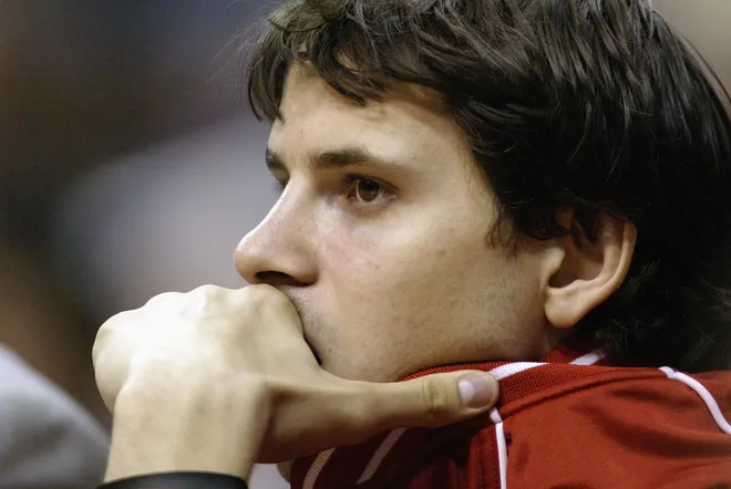 LOS ANGELES - NOVEMBER 24: Bostjan Nachbar #9 of the Houston Rockets looks on during the game against the Los Angeles Clippers on November 24, 2003 at Staples Center in Los Angeles, California. The Rockets won 105-90. NOTE TO USER: User expressly acknowledges and agrees that, by downloading and/or using this Photograph, User is consenting to the terms and conditions of the Getty Images License Agreement. (Photo by Lisa Blumenfeld/Getty Images)