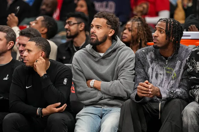 Feb 24, 2026; Atlanta, Georgia, USA; Washington Wizards guard Trae Young (3) watches from the bench during the game against the Atlanta Hawks during the second half at State Farm Arena. Mandatory Credit: Dale Zanine-Imagn Images