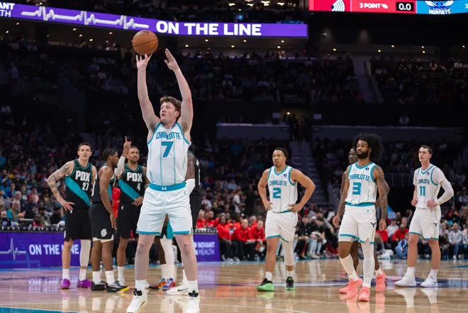 Feb 28, 2026; Charlotte, North Carolina, USA; Charlotte Hornets guard Kon Knueppel (7) shoots a free throw during the first quarter against the Portland Trail Blazers at Spectrum Center. Mandatory Credit: Scott Kinser-Imagn Images