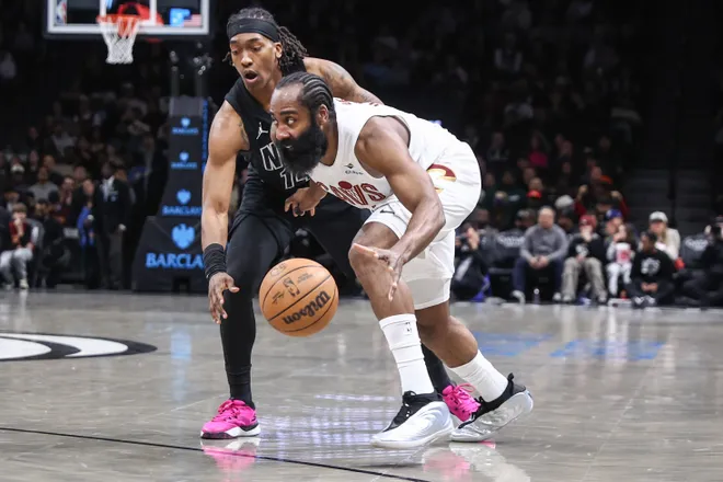 Mar 1, 2026; Brooklyn, New York, USA; Cleveland Cavaliers guard James Harden (1) looks to drive past Brooklyn Nets guard Terance Mann (14) in the first quarter at Barclays Center. Mandatory Credit: Wendell Cruz-Imagn Images