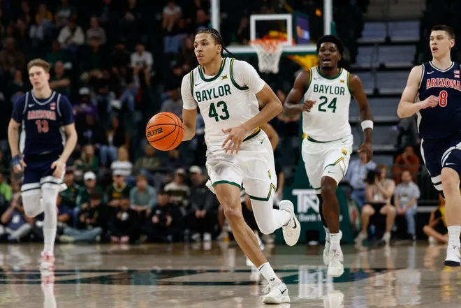 Feb 24, 2026; Waco, Texas, USA; Baylor Bears guard Cameron Carr (43) dribbles the ball upcourt against the Arizona Wildcats during the first half at Paul and Alejandra Foster Pavilion. Mandatory Credit: Chris Jones-Imagn Images