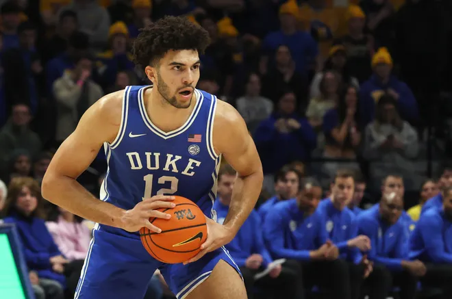 Feb 10, 2026; Pittsburgh, Pennsylvania, USA; Duke Blue Devils forward Cameron Boozer (12) handles the ball against the Pittsburgh Panthers during the first half at Petersen Events Center. Mandatory Credit: Charles LeClaire-Imagn Images