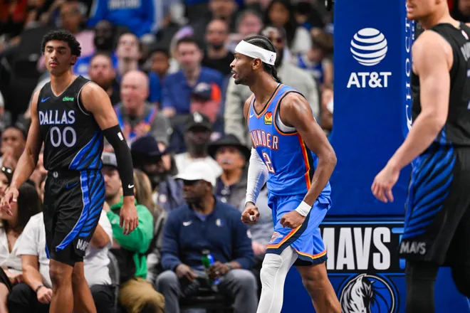 Mar 1, 2026; Dallas, Texas, USA; Oklahoma City Thunder guard Shai Gilgeous-Alexander (2) celebrates after he dunks the ball over Dallas Mavericks guard Max Christie (00) during the second quarter at the American Airlines Center. Mandatory Credit: Jerome Miron-Imagn Images