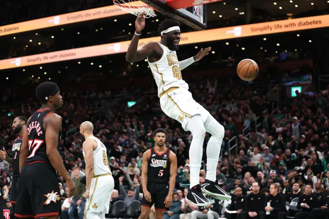 Mar 1, 2026; Boston, Massachusetts, USA; Boston Celtics center Neemias Queta (88) dunks the ball during the second half against the Philadelphia 76ers at TD Garden. Mandatory Credit: Paul Rutherford-Imagn Images