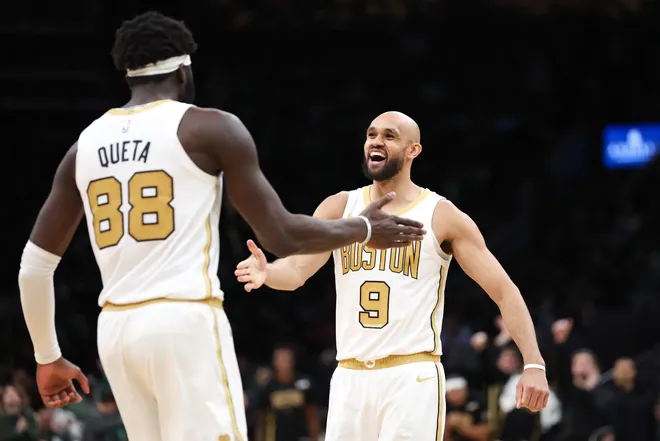 Mar 1, 2026; Boston, Massachusetts, USA; Boston Celtics guard Derrick White (9) reacts during the second half against the Philadelphia 76ers at TD Garden. Mandatory Credit: Paul Rutherford-Imagn Images