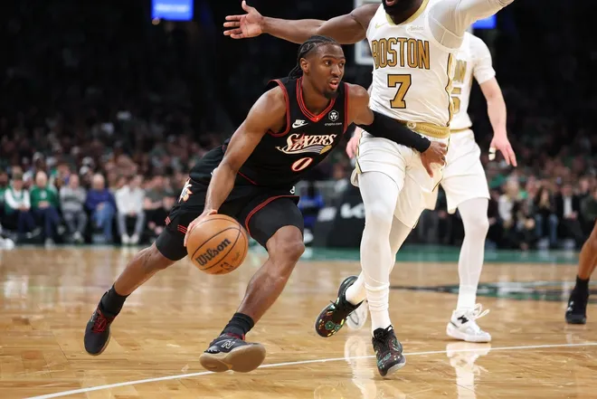 Mar 1, 2026; Boston, Massachusetts, USA; Philadelphia 76ers guard Tyrese Maxey (0) drives to the basket during the first half against the Boston Celtics at TD Garden.