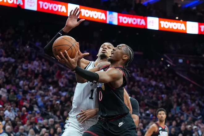 PHILADELPHIA, PENNSYLVANIA - MARCH 3: Tyrese Maxey #0 of the Philadelphia 76ers shoots the ball against Victor Wembanyama #1 of the San Antonio Spurs in the first quarter at Xfinity Mobile Arena on March 3, 2026 in Philadelphia, Pennsylvania. NOTE TO USER: User expressly acknowledges and agrees that, by downloading and or using this photograph, User is consenting to the terms and conditions of the Getty Images License Agreement. (Photo by Mitchell Leff/Getty Images)