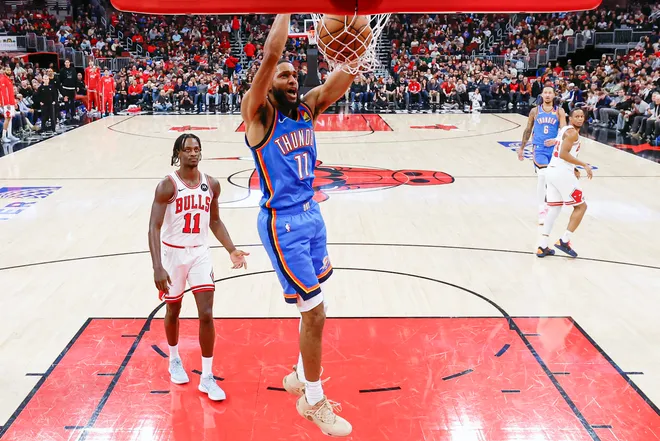 Mar 3, 2026; Chicago, Illinois, USA; Oklahoma City Thunder guard Isaiah Joe (11) dunks the ball against the Chicago Bulls during the second half at United Center. Mandatory Credit: Kamil Krzaczynski-Imagn Images