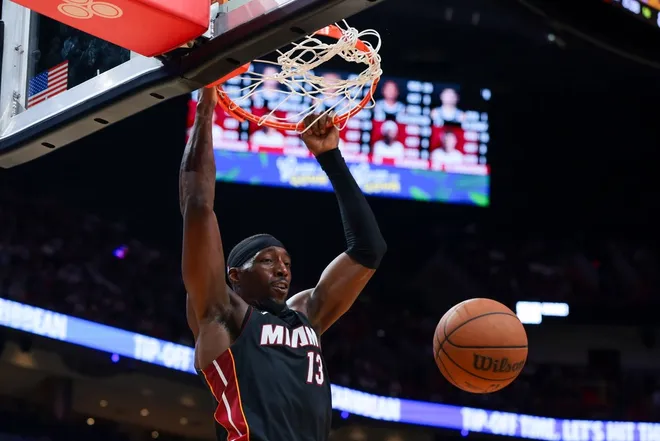 Mar 3, 2026; Miami, Florida, USA; Miami Heat center Bam Adebayo (13) dunks against the Brooklyn Nets during the fourth quarter at Kaseya Center.