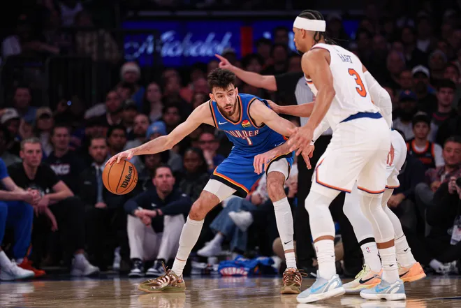 Mar 4, 2026; New York, New York, USA; Oklahoma City Thunder center Chet Holmgren (7) is guarded by New York Knicks guard Jalen Brunson (11) and guard Josh Hart (3) during the second half at Madison Square Garden. Mandatory Credit: Vincent Carchietta-Imagn Images