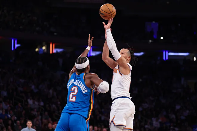 Mar 4, 2026; New York, New York, USA; New York Knicks guard Jalen Brunson (11) makes a basket against Oklahoma City Thunder guard Shai Gilgeous-Alexander (2) during the second half at Madison Square Garden. Mandatory Credit: Vincent Carchietta-Imagn Images
