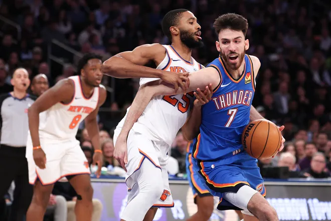 Mar 4, 2026; New York, New York, USA; Oklahoma City Thunder center Chet Holmgren (7) goes to the basket against New York Knicks guard Mikal Bridges (25) during the first half at Madison Square Garden. Mandatory Credit: Vincent Carchietta-Imagn Images