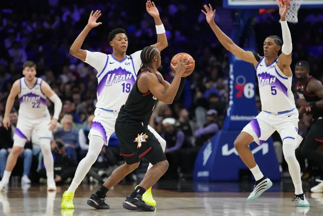 Mar 4, 2026; Philadelphia, Pennsylvania, USA; Philadelphia 76ers guard Tyrese Maxey (0) controls the ball pressured by Utah Jazz guard Ace Bailey (19) and forward Cody Williams (5) in the fourth quarter at Xfinity Mobile Arena. Mandatory Credit: Kyle Ross-Imagn Images