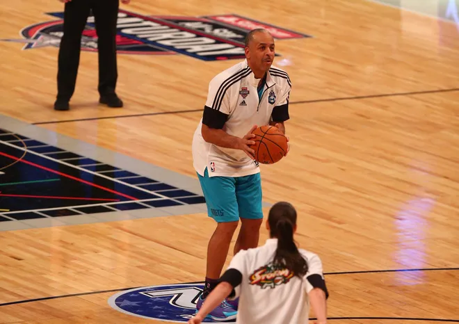Team Curry legend Dell Curry shoots the basketball during the 2015 NBA All Star Shooting Stars competition.