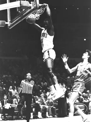 Walter Berry scores for St. John's.