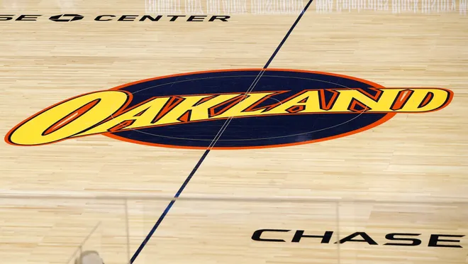; An Oakland logo is displayed at halfcourt as seen before the game between the Golden State Warriors and the Boston Celtics.