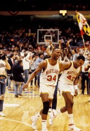 Maryland Terrapins forward Len Bias (34) and teammate Herman Veal (42).