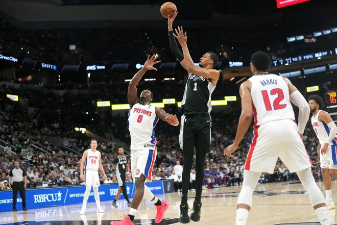 Mar 5, 2026; San Antonio, Texas, USA; San Antonio Spurs forward Victor Wembanyama (1) shoots over Detroit Pistons center Jalen Duren (0) during the first half at Frost Bank Center.