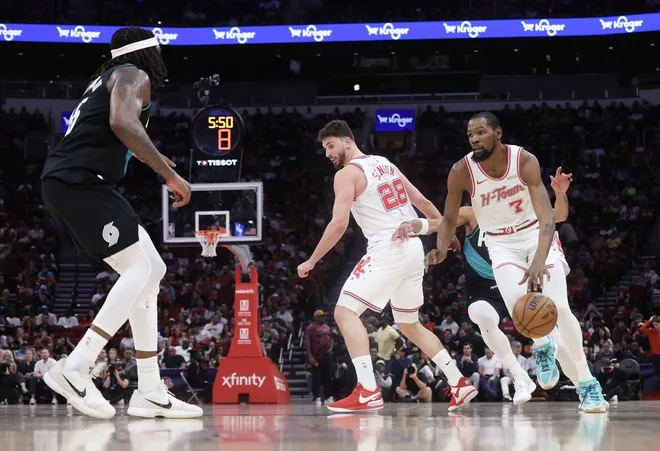 Mar 6, 2026; Houston, Texas, USA; Houston Rockets center Alperen Sengun (28) sets up a pick against Portland Trail Blazers forward Toumani Camara (33) as Houston Rockets forward Kevin Durant (7) dribbles against Portland Trail Blazers guard Jrue Holiday (5) in the first half at Toyota Center.