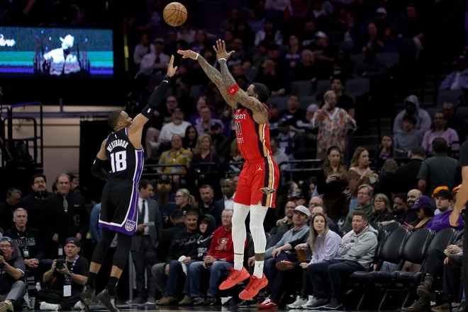 Mar 5, 2026; Sacramento, California, USA; New Orleans Pelicans guard-forward Saddiq Bey (41) shoots over Sacramento Kings guard Russel Westbrook (18) during the third quarter at Golden 1 Center.