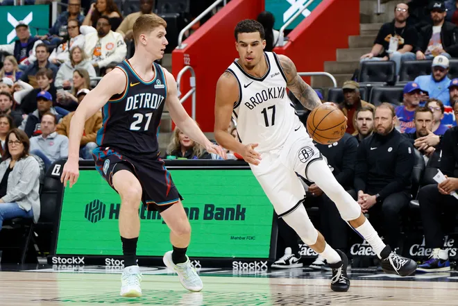 Mar 7, 2026; Detroit, Michigan, USA; Brooklyn Nets forward Michael Porter Jr. (17) dribbles defended by Detroit Pistons guard Kevin Huerter (27) in the first half at Little Caesars Arena. Mandatory Credit: Rick Osentoski-Imagn Images