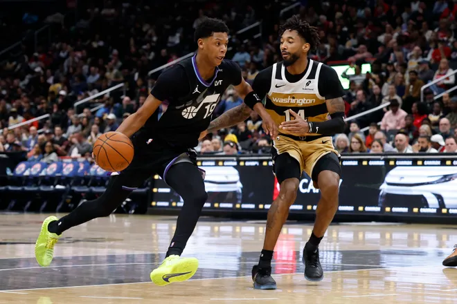 Mar 5, 2026; Washington, District of Columbia, USA; Utah Jazz guard Ace Bailey (19) drives to the basket as Washington Wizards forward Leaky Black (14) defends in the second half at Capital One Arena. Mandatory Credit: Geoff Burke-Imagn Images