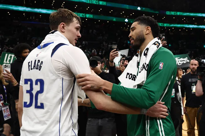 Mar 6, 2026; Boston, Massachusetts, USA; Boston Celtics forward Jayson Tatum (0) and Dallas Mavericks forward Cooper Flagg (32) talk after their game at TD Garden. Mandatory Credit: Winslow Townson-Imagn Images