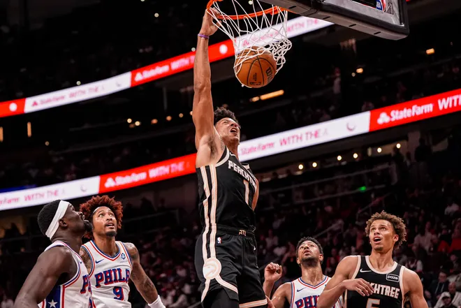 Mar 7, 2026; Atlanta, Georgia, USA; Atlanta Hawks forward Jalen Johnson (1) dunks against the Philadelphia 76ers during the second half at State Farm Arena. Mandatory Credit: Dale Zanine-Imagn Images
