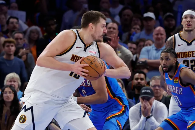 Mar 9, 2026; Oklahoma City, Oklahoma, USA; Denver Nuggets center Nikola Jokić (15) drives to the basket against the Oklahoma City Thunder during the second half at Paycom Center. Mandatory Credit: Alonzo Adams-Imagn Images