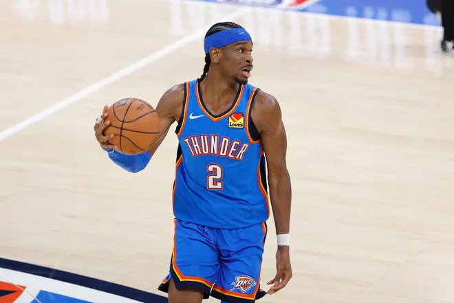 Mar 9, 2026; Oklahoma City, Oklahoma, USA; Oklahoma City Thunder guard Shai Gilgeous-Alexander (2) dribbles down the court against the Denver Nuggets during the second half at Paycom Center. Mandatory Credit: Alonzo Adams-Imagn Images