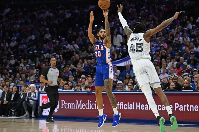 Mar 10, 2026; Philadelphia, Pennsylvania, USA; Philadelphia 76ers guard Cameron Payne (20) shoots a three point basket over Memphis Grizzlies forward GG Jackson (45) during the second half at Xfinity Mobile Arena. Mandatory Credit: Eric Hartline-Imagn Images