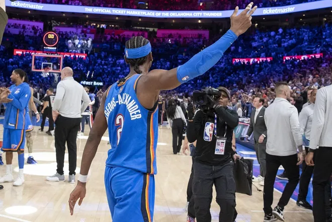 Mar 9, 2026; Oklahoma City, Oklahoma, USA; Oklahoma City Thunder guard Shai Gilgeous-Alexander (2) gestures and walks around the court after sinking a game winner 3 pointer basket against the Denver Nuggets during the second half at Paycom Center.