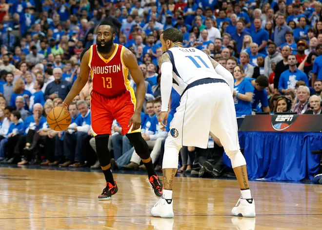 Houston Rockets guard James Harden drives against Dallas Mavericks guard Monta Ellis.
