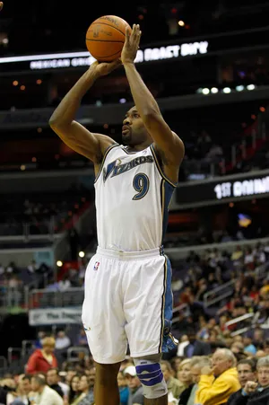Washington Wizards guard Gilbert Arenas shoots the ball against the Philadelphia 76ers.