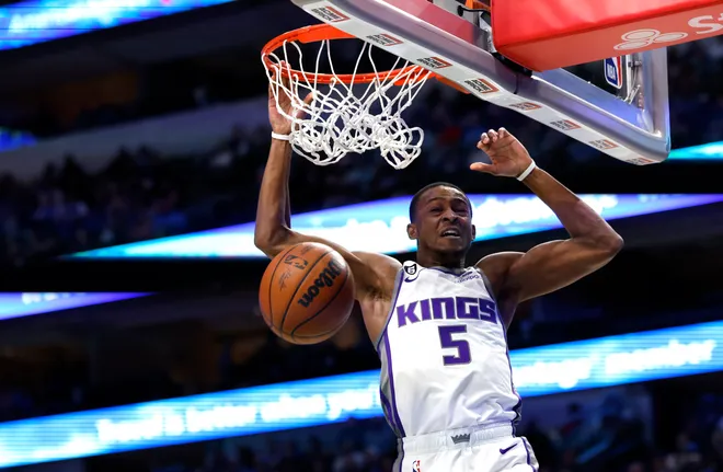 DeAaron Fox #5 of the Sacramento Kings scores on a slam dunk.