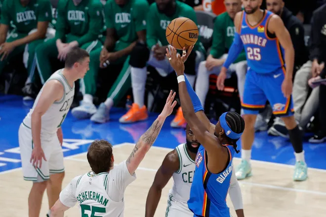 Mar 12, 2026; Oklahoma City, Oklahoma, USA; Oklahoma City Thunder guard Shai Gilgeous-Alexander (2) shoots and scores a basket in the third quarter against the Boston Celtics at Paycom Center to pass Wilt Chamberlain with the most consecutive 20 points in a game. Mandatory Credit: Alonzo Adams-Imagn Images