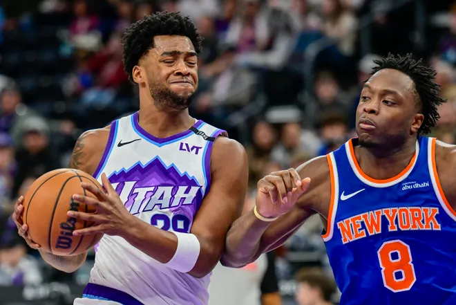 Mar 11, 2026; Salt Lake City, Utah, USA; Utah Jazz forward Brice Sensabaugh (28) drives to the basket into New York Knicks forward/guard OG Anunoby (8) during the second half at Delta Center. Mandatory Credit: Peter Creveling-Imagn Images