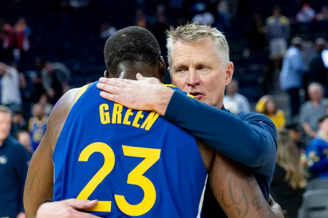 Mar 10, 2026; San Francisco, California, USA; Golden State Warriors head coach Steve Kerr and Golden State Warriors forward Draymond Green (23) embrace after the game against the Chicago Bulls at Chase Center. Mandatory Credit: Bob Kupbens-Imagn Images