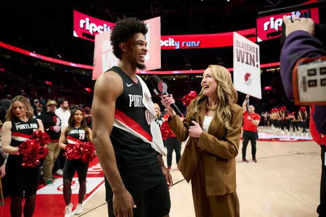 Mar 8, 2026; Portland, Oregon, USA; Portland Trail Blazers guard Scoot Henderson (00) laughs during a post game interview after a game against the Indiana Pacers at Moda Center. Mandatory Credit: Troy Wayrynen-Imagn Images