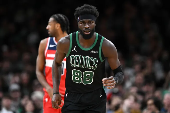Mar 14, 2026; Boston, Massachusetts, USA; Boston Celtics center Neemias Queta (88) runs up the court during the first half of a game against the Washington Wizards at the TD Garden. Mandatory Credit: Brian Fluharty-Imagn Images