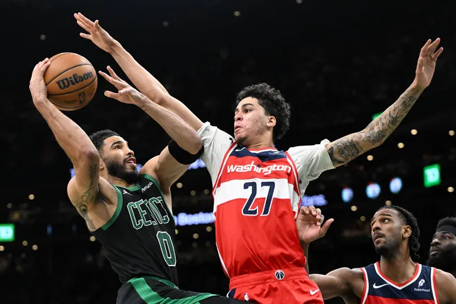 Mar 14, 2026; Boston, Massachusetts, USA; Boston Celtics forward Jayson Tatum (0) attempts a shot against Washington Wizards guard Will Riley (27) during the first half at the TD Garden. Mandatory Credit: Brian Fluharty-Imagn Images