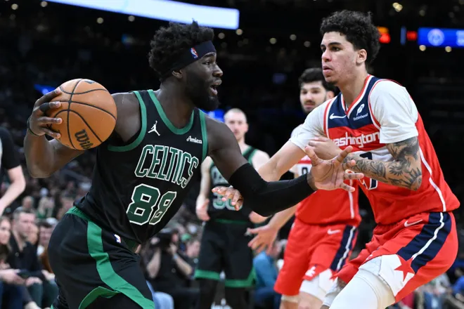 Mar 14, 2026; Boston, Massachusetts, USA; Boston Celtics center Neemias Queta (88) drives to the basket against the Washington Wizards during the second half at the TD Garden. Mandatory Credit: Brian Fluharty-Imagn Images