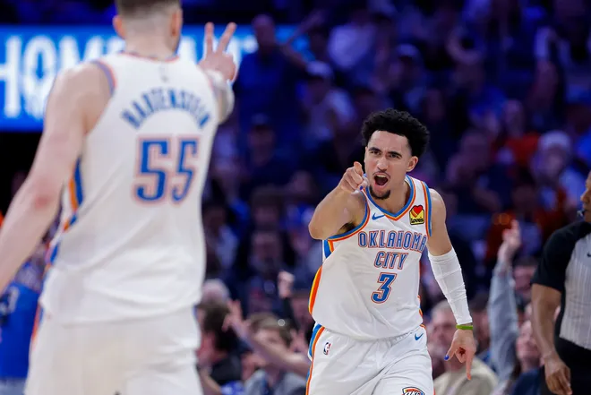 Mar 15, 2026; Oklahoma City, Oklahoma, USA; Oklahoma City Thunder guard Jared McCain (3) gestures towards teammate, center/forward Isaiah Hartenstein (55) after scoring against the Minnesota Timberwolves during the second half at Paycom Center. Mandatory Credit: Alonzo Adams-Imagn Images