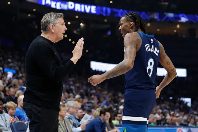 Mar 15, 2026; Oklahoma City, Oklahoma, USA; Minnesota Timberwolves Head Coach Chris Finch talks to Minnesota Timberwolves guard Bones Hyland (8) during a break in play against the Oklahoma City Thunder during the first half at Paycom Center. Mandatory Credit: Alonzo Adams-Imagn Images