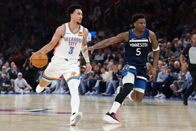 Mar 15, 2026; Oklahoma City, Oklahoma, USA; Oklahoma City Thunder guard Jared McCain (3) dribbles down the court beside Minnesota Timberwolves guard Anthony Edwards (5) during the first half at Paycom Center. Mandatory Credit: Alonzo Adams-Imagn Images